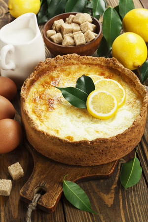 Homemade lemon flan on the wooden tableの写真素材
