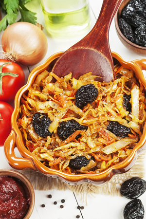 Cabbage stewed with prunes and tomato pastaの写真素材