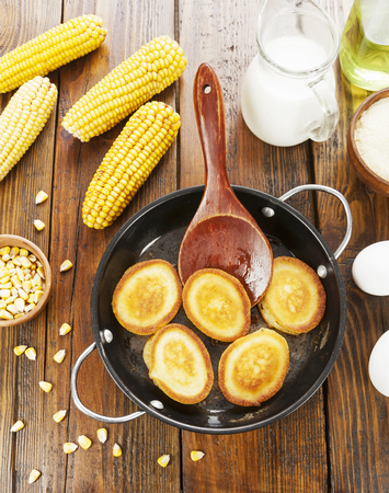 Pancakes with corn flour on the table