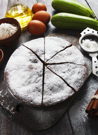 Zucchini cake with cocoa powder and icing sugarの写真素材