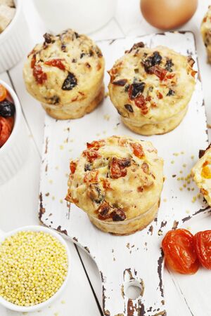Millet muffins with dried fruits on the tableの写真素材