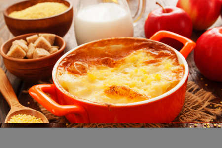 Homemade millet casserole on a wooden table