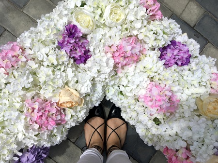 Woman feet, flowers and love. Wedding and flowers, loveの写真素材