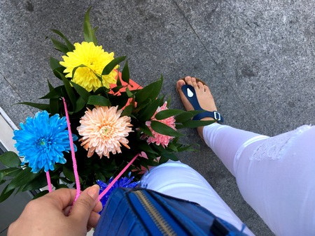 Flowers. And women. Without them, life would be boringの写真素材
