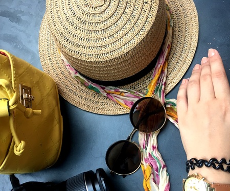 Women sunglasses. Bag, glasses, hat, camera, watch of young girls.の写真素材