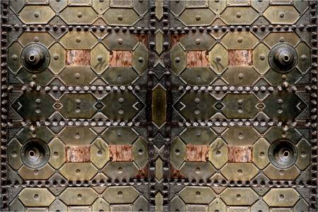 Oriental iron designs and ornaments on the wooden door.の写真素材