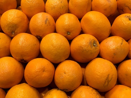 Oranges. Fruit. Fragment from a fruit and vegetable shop.