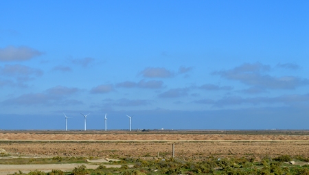 Wind generators along the road. Wind energy. Wind power. Wind power station. Clean nature, clean...