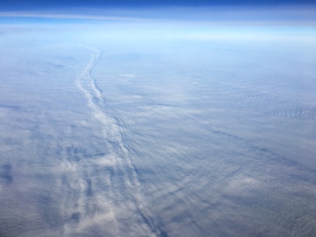 A miracle of nature. The road over clouds and with clouds. From a series of unique photos from the airplane window.の写真素材