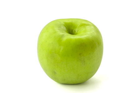 Green apple isolated on white backgroundの写真素材
