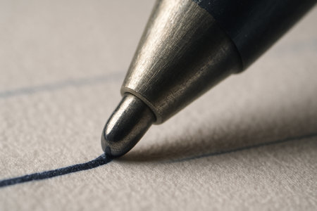 Close up of a pen on a sheet of paper with copy spaceの素材
