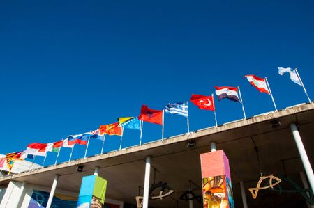 Barcelona Spain June 12. 2019 Flags moving and blue sky