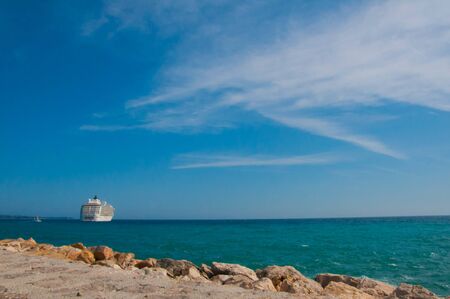 Stone beach and beautiful blue skyの写真素材