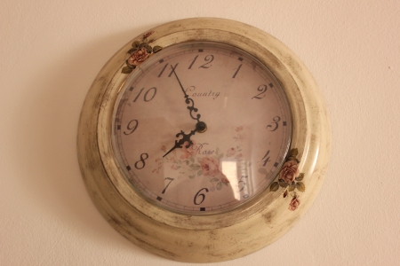 one old colck on the wall の写真素材