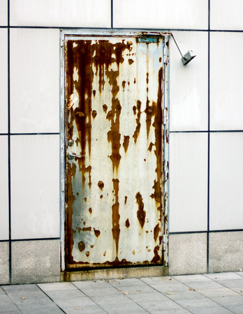 Rust door with wallの写真素材