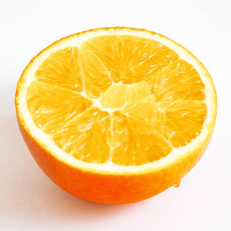 Close up of fresh fruit, orange and white backgroundの写真素材