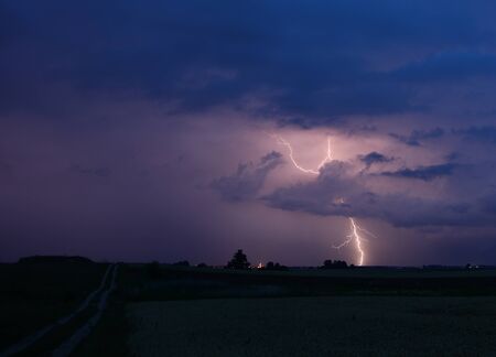 Angry cloud with rain shaft and lightning bolt