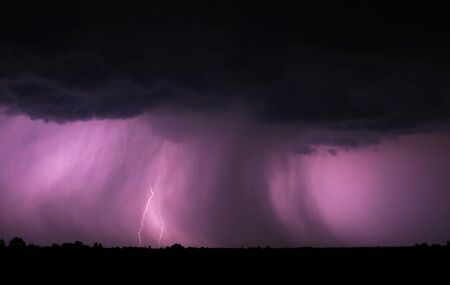 Angry cloud with rain shaft and lightning bolt
