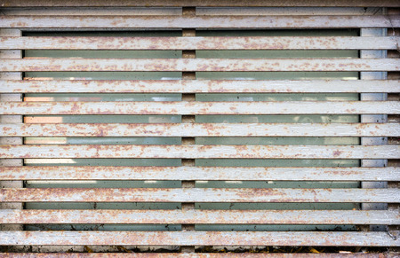 old rusty metal grid fenceの写真素材