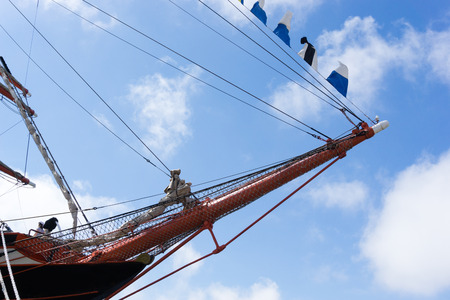 Old vintage ship nose on blue sky backgroundの写真素材