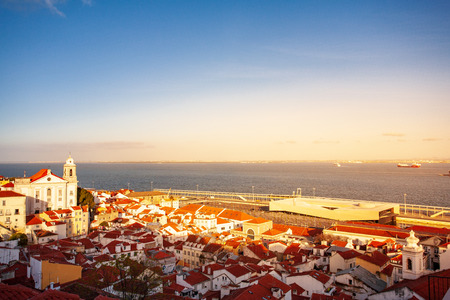 Old Lisbon Portugal steet. cityscape with roofs. Tagus river miraduro viewpoint. Spring and summer. View from sao jorge castleの写真素材