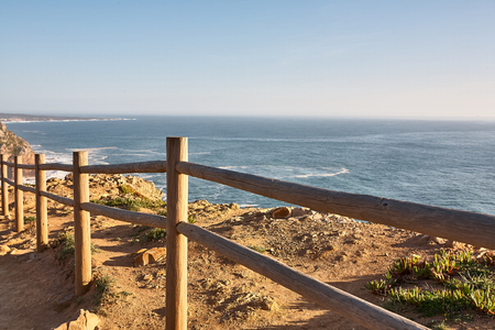Exploring Portugal. Cabo da Roca ocean and mountains view, authentic capture, wanderlust concept. summer springの写真素材