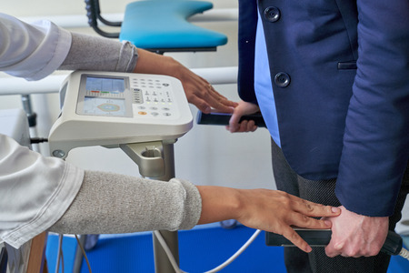 Close up of woman Body Composition Analysis by doctor before Fitness Activity. Woman Checking body...