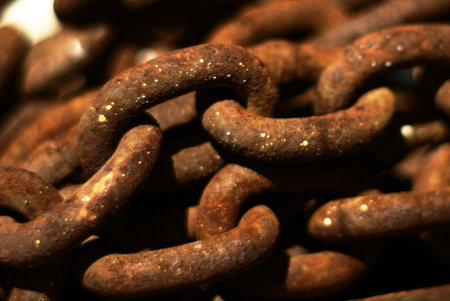 an abstract close-up photo of rusty obsolete chains