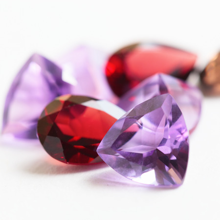 Colorful gemstones with garnet, quartz and amethyst stonesの写真素材