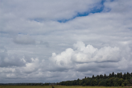gray dramatic sky with large cloudsの写真素材