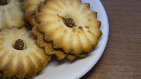 Cookies with a filling on the tableの写真素材