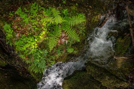 The beautiful Hinanger waterfall, a popular hike in the Allgau near Sonthofenの写真素材