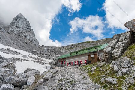Beautiful hike and climb to the Zugspitze near Ehrwald and Eibsee, the highest mountain in Germanyの写真素材
