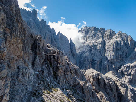 Climbing Rotwand via ferrata near Sexten in the Dolomites, South Tyrol, Italyの写真素材