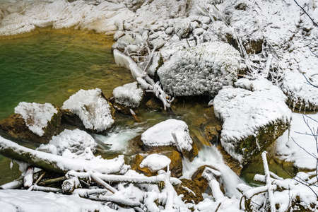 The beautifully icy Scheidegger waterfalls with a hike in the areaの写真素材