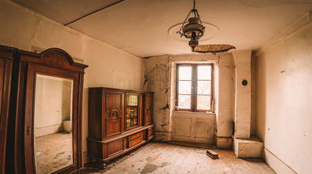 old abandoned manor house, a Lost Place with antique furniture and wonderful architectureの写真素材