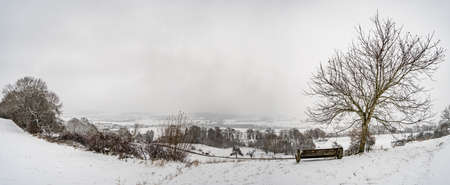 Winter hike in snow from Wilhelmsdorf on the Hoechsten near Illmensee on Lake Constanceの写真素材