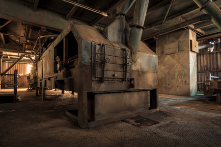 Creepy abandoned industry area with natural decay so-called lost place a decayed factory hallの写真素材