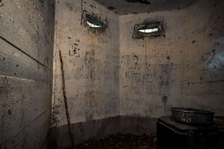 An old little bunker from the second world was near a factory in the woodsの写真素材