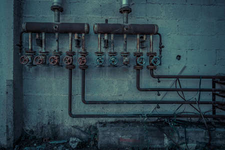 Creepy abandoned industry area with natural decay so-called lost place a decayed factory hallの写真素材