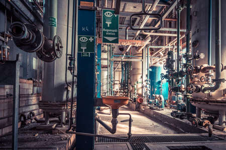Creepy abandoned industry area with power plant a lost place a decayed factory hall