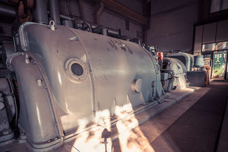 Creepy abandoned industry area with power plant a lost place a decayed factory hall