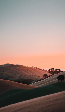 Sunset over rolling hills in the countryside of New South Wales, Australiaの素材