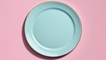 Empty blue plate on pastel pink background. Minimal style.の素材