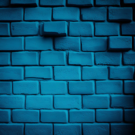 Blue brick wall texture or background for design with vignette.の素材