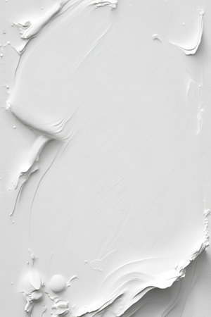 close up of a white paint brush stroke on a white paper backgroundの素材