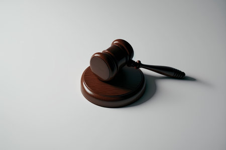 Wooden judge gavel on a white background. 3d renderingの素材