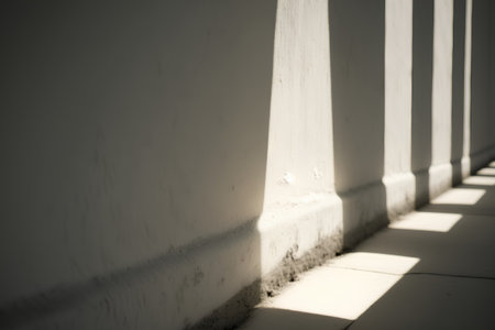 shadow on the white wall with sunlight and shadow on the floor.の素材