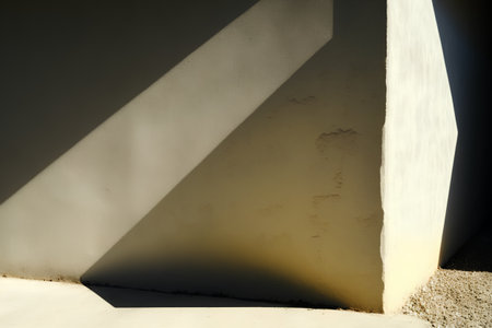 Abstract background of concrete wall with shadow from sunlight. Copy space.の素材