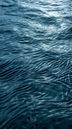 blue sea water surface with ripples. close-up photo.の素材